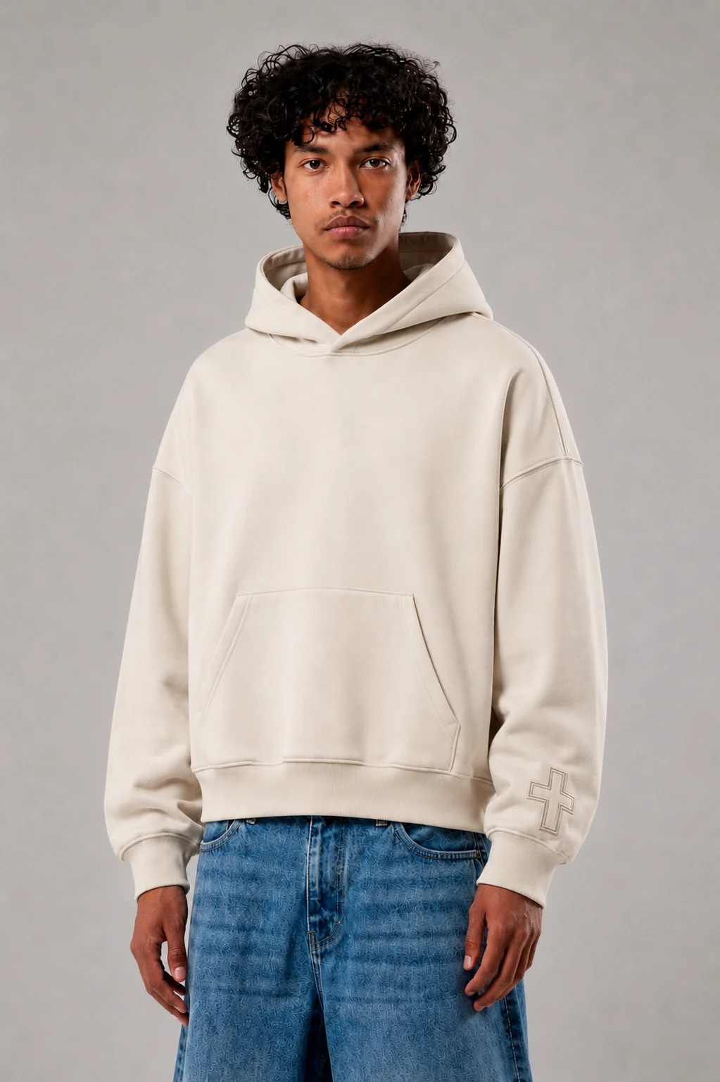 Cross-Sleeve Hoodie worn by model